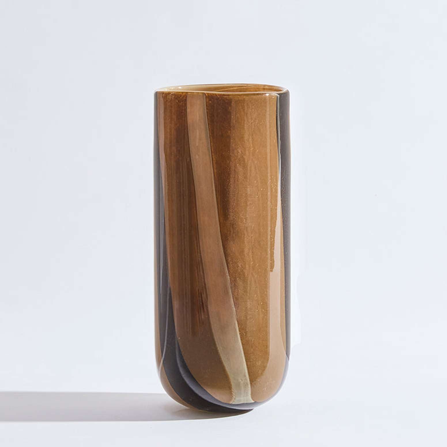 Chocolate glass vase with soft stripe details and warm tones