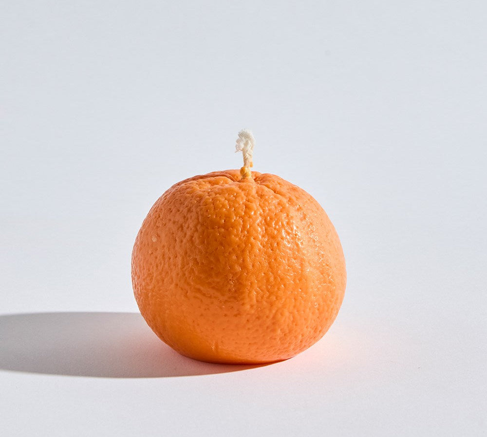 Naval Orange Large Candle, frontal view of bold, cheerful candle in orange color