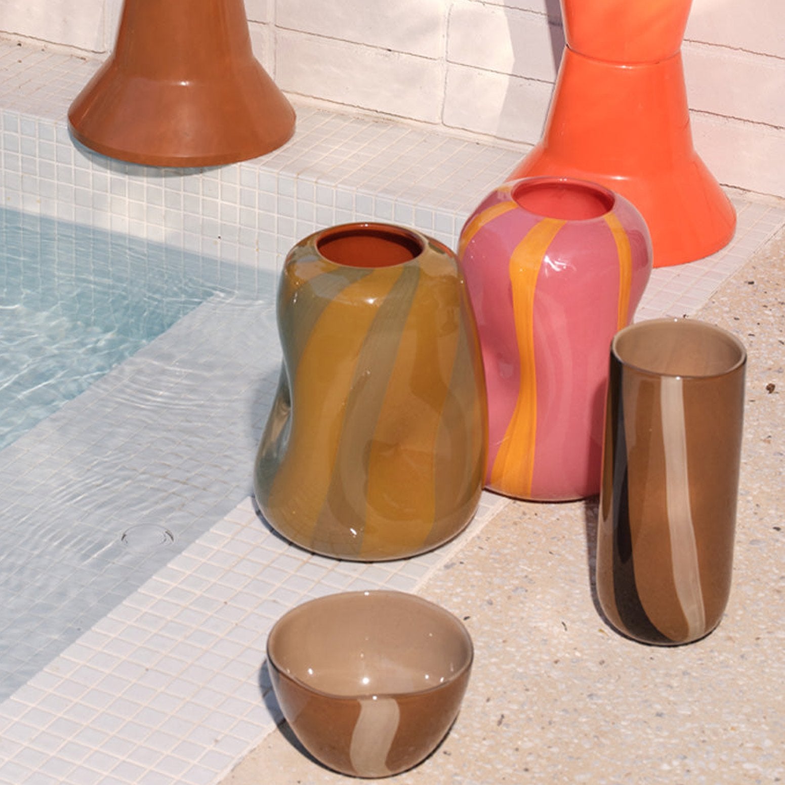 Pink glass Candy vase with smooth curves and layered color.