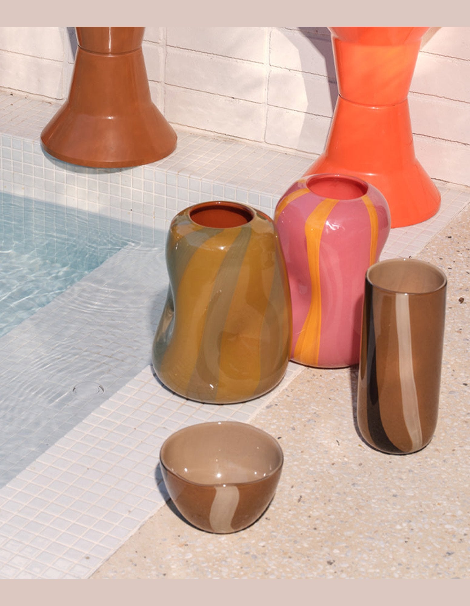 Pink glass Candy vase with smooth curves and layered color.