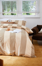 Breeze Blush Quilt Cover Set, flat lay with bold stripes and modern design