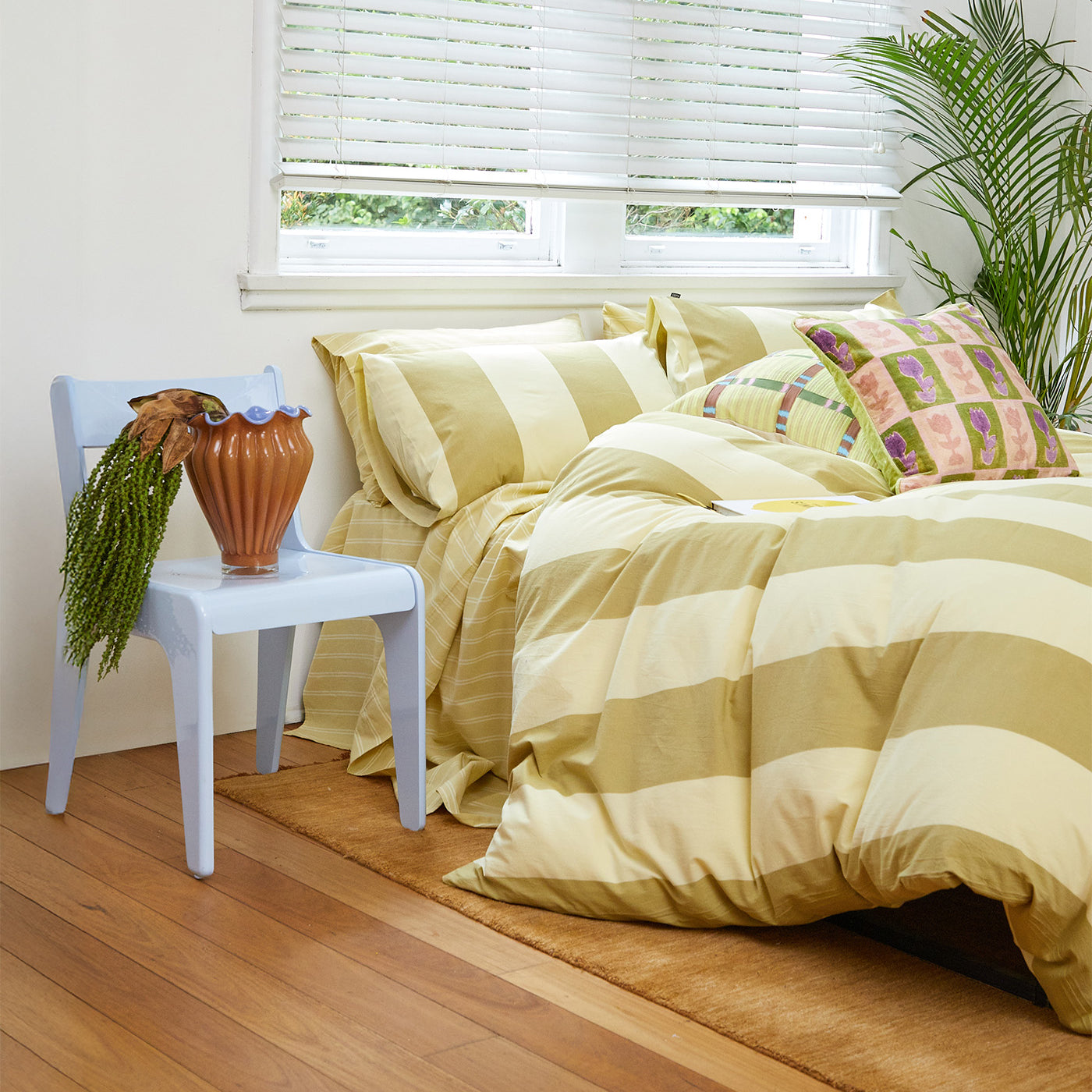 Breeze Lime Quilt Cover Set, lime green striped quilt with pillowcases, flat lay